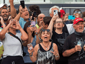 Protestors wait for Justin Trudeau to arrive for a campaign event in Bolton, Ont., on August 27, 2021. The event was cancelled over security concerns.