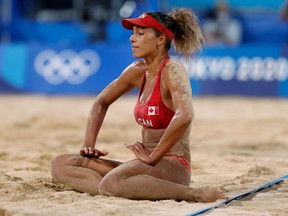 Brandie Wilkerson of Canada on the ground during her quarter-final match. REUTERS/Pilar Olivares