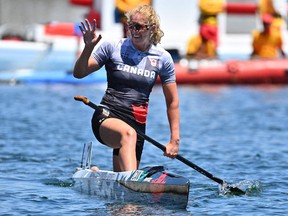 Silver medallist Canada's Laurence Vincent-Lapointe celebrates after the women's canoe single 200m final during the Tokyo 2020 Olympic Games at Sea Forest Waterway in Tokyo on August 5, 2021. (Photo by Philip FONG / AFP)