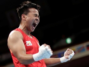 Nesthy Petecio of the Philippines reacts after winning her fight against Irma Testa of Italy.