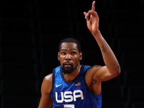 Kevin Durant led Team USA to a decisive victory over Spain in Olympic men's basketball on Tuesday, earning a ticket to the semifinals.