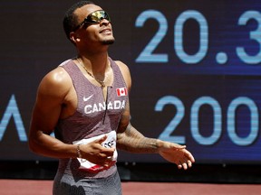 Tokyo 2020 Olympics - Athletics - Men's 200m - Round 1 - Olympic Stadium, Tokyo, Japan - August 3, 2021. Andre De Grasse of Canada reacts after competing REUTERS/Phil Noble