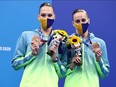 Bronze medallists Marta Fiedina and Anastasiya Savchuk of Ukraine pose with their medals.
