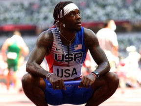 Cravon Gillespie of the United States reacts after Heat 2. The U.S. Olympic men's 4x100m relay team failed to qualify for the final.