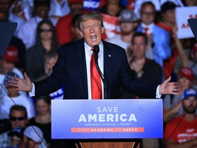 Former U.S. President Donald Trump addresses supporters during a "Save America" rally at York Family Farms on August 21, 2021 in Cullman, Alabama.