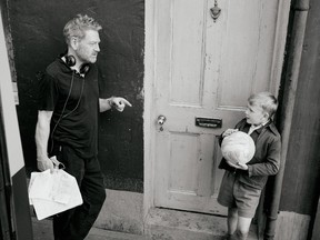 Kenneth Branagh and Jude Hill on the set of Belfast.