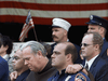 Members of the New York Fire Department embrace at the funeral of Father Mychal Judge, a fire department chaplain who died on duty on September 11, 2001 as the World Trade Center towers collapsed.