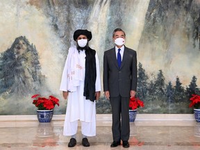 Chinese State Councilor and Foreign Minister Wang Yi meets with Mullah Abdul Ghani Baradar, political chief of Afghanistan's Taliban, in Tianjin, China on July 28.