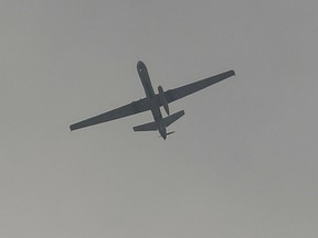 A drone flies over the airport in Kabul on Aug. 31.
