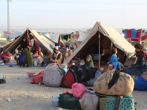 Afghan refugees rest in tents at a makeshift shelter camp in Chaman, a Pakistani town at the border with Afghanistan, on Aug. 31.