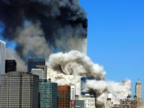 In this file photo taken on September 11, 2001, smoke billows after the first of the two towers of the World Trade Center collapses.