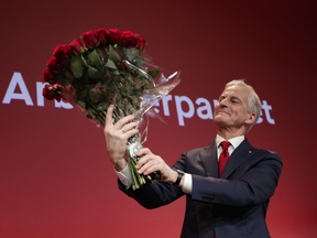 Norway just had an election too! Here, Labour leader Jonas Gahr Store (think of him like a more pro-oil version of NDP Leader Jagmeet Singh) holds a bouquet of roses after defeating the country's incumbent Conservative Party.