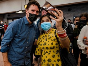 Justin Trudeau is seen during a meet and greet with constituents at the Jarry Metro station in Montreal, early on the morning of Sept. 21, 2021.