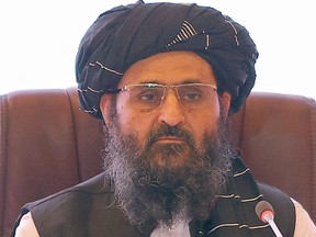 The leader of the Taliban negotiating team, Mullah Abdul Ghani Baradar, listens on July 18, 2021, to the final declaration of the peace talks between the Afghan government and the Taliban in Qatar's capital Doha.