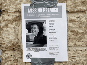 A mock missing poster for Alberta Premier Jason Kenney is seen taped to post near Edmonton City Hall. Kenney was last seen in public on August 9.