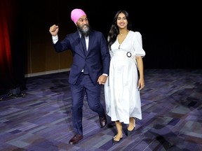 Canada's New Democratic Party (NDP) leader Jagmeet Singh and his wife Gurkiran Kaur Sidhu, arrive to deliver remarks on election night in Vancouver, British Columbia, Sept. 20, 2021.