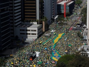 Supporters of far-right President Jair Bolsonaro march in a show of support for his attacks on the country's Supreme Court, in Sao Paulo, Brazil, Sept. 7.