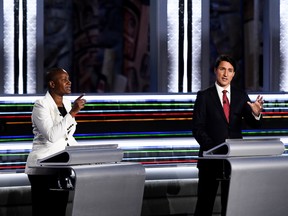 Green Party Leader Annamie Paul, left, and Liberal Leader Justin Trudeau, take part in the federal election English-language Leaders debate in Gatineau, Quebec, Canada, September 9, 2021.