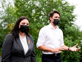 Justin Trudeau walks with candidate Jenica Atwin during an election campaign stop in Fredericton, N.B., on Sept 15.