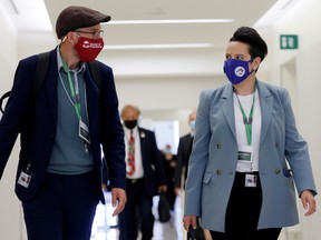 Newly elected Conservative MP Melissa Lantsman, right, arrives at an orientation session for new MPs in Ottawa, alongside Green MP Mike Morrice, on Sept. 27.