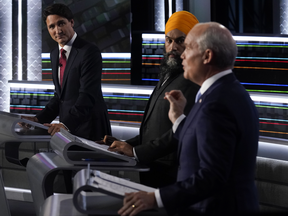Liberal Leader Justin Trudeau, left to right, NDP Leader Jagmeet Singh, and Conservative Leader Erin O'Toole take part in the federal election English-language Leaders debate in Gatineau, Que., on Thursday, Sept. 9, 2021.