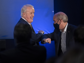 Former prime minister Brian Mulroney bumps elbows with Conservative Leader Erin O'Toole at a Wednesday campaign event in Quebec. Many wags have noted that O'Toole started Wednesday by promising he was not leading "your dad’s Conservative Party,” and then ended the day by appearing alongside the guy who indeed headed everyone's dad's Conservative Party.