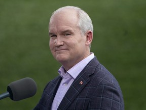 Conservative leader Erin O'Toole looks towards reporters as he listens to a question during a campaign stop at a vineyard Friday, September 17, 2021 in London, Ontario.