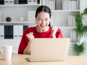 Excited female feeling euphoric celebrating online win success achievement result, young woman happy about good email news, motivated by great offer or new opportunity, passed exam, got a job