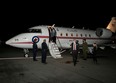 Michael Kovrig and Michael Spavor, accompanied by Canada's Ambassador to China, Domenic Barton, arrive after being released from detention in China, in Calgary, September 25, 2021.