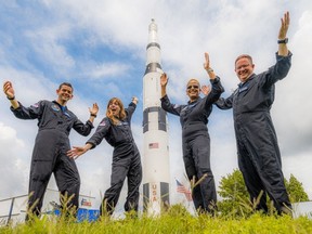 In this July 1, 2021, photo courtesy of Netflix, the Inspiration4 crew (L-R) Jared Isaacman, Hayley Arceneaux, Sian Proctor and Chris Sembroski pose for a photo. - The Inspiration4 mission, which will be the first to send only civilians into space for several days aboard a SpaceX rocket, will be available to watch in "near real time" in a documentary series on Netflix, the streaming platform announced on August 19, 2021.