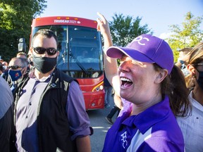 The People's Party of Canada's candidate for Elgin-Middlesex-London  Chelsea Hillier was one of several protesters who stood in the road and slowed the progress of the Justin Trudeau's bus after a campaign stop at the London Brewing Co-Operative in London, Ont. on Sept. 6, 2021.