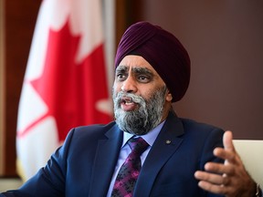 Defence Minister Harjit Sajjan, seen in a file photo from Dec. 17, 2020, has lost all credibility when it comes to the military's sexual misconduct crisis, writes Sabrina Maddeaux. But replacing him with a female won't simply solve the problem, she says.