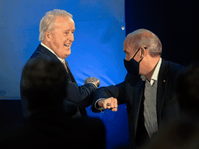 Conservative Leader Erin O'Toole is introduced by former prime minister Brian Mulroney during a campaign rally in Orford, Que., on September 15, 2021.