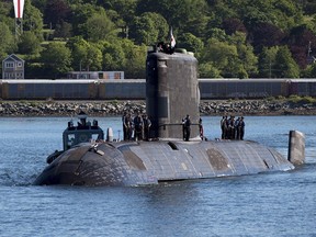 HMCS Windsor, one of Canada's four Victoria-class long range patrol submarines, in Halifax port in 2018. THE CANADIAN PRESS/Andrew Vaughan