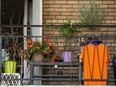 An orange t-shirt hangs on a balcony in Toronto in preparation for the first National Day for Truth and Reconciliation on Thursday, Sept. 30. (Peter J Thompson/National Post)