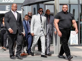 In this file photo taken on June 6, 2019, singer R. Kelly leaves the Leighton Criminal Court Building after a hearing on sexual abuse charges in Chicago. (Photo by KAMIL KRZACZYNSKI / AFP)