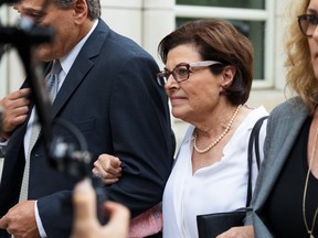 Nancy Salzman, former president and co-founder of Nxivm, center, arrives at federal court ahead of sentencing in the Brooklyn borough of New York, U.S., on Sept. 8.
