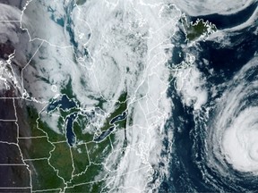 A satellite image shows Hurricane Larry in the Atlantic Ocean, moving north toward Newfoundland and Labrador.
