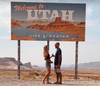 Petito and Laundrie at a welcome sign for the state of Utah.