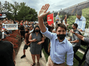 Protesters shout as Liberal Leader Justin Trudeau arrives to campaign in Nobleton, Ont., on August 27.