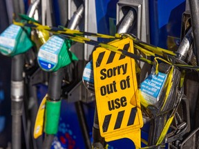 Closed fuel pumps at an Esso station near Guildford, 30 kilometres southwest of London.