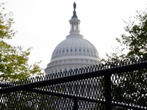 A security fence, erected in a single overnight effort, surrounds the U.S. Capitol ahead of an expected rally Saturday in support of the Jan. 6 defendants in Washington, DC, U.S., Sept. 16.