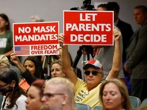Florida residents protest mask mandates in schools to prevent the spread of COVID-19.