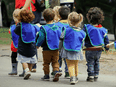 Daycare children walk down a street in Montreal. Bloc Québécois supporters rate the issue higher than supporters of any other federal party.