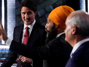 Liberal Leader Justin Trudeau, left to right, NDP Leader Jagmeet Singh, and Conservative Leader Erin O'Toole take part in the federal election English-language Leaders debate in Gatineau, Que., Sept. 9, 2021. Adrian Wyld/REUTERS