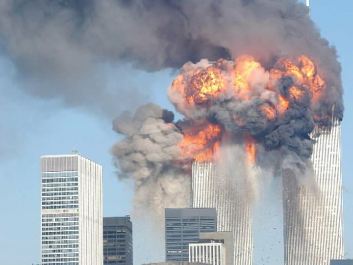  A fiery blasts rocks the World Trade Center after being hit by two planes September 11, 2001 in New York City.