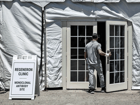 A man enters a monoclonal antibody treatment clinic in Pembroke Pines, Florida.