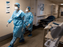 Nurses do rounds inside the COVID-19 unit of a Montreal hospital, on February 16, 2021.