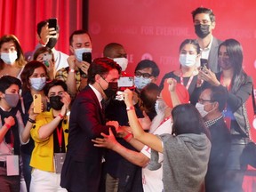 Justin Trudeau, greets his supporters during the Liberal election night party in Montreal, Quebec, Canada, Sept. 21, 2021. REUTERS/Christinne Muschi