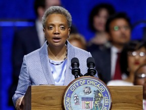 Lori Lightfoot speaks after being sworn in as Chicago's 56th mayor by Judge Susan E. Cox during an inauguration ceremony at Wintrust Arena in Chicago, May 2019.